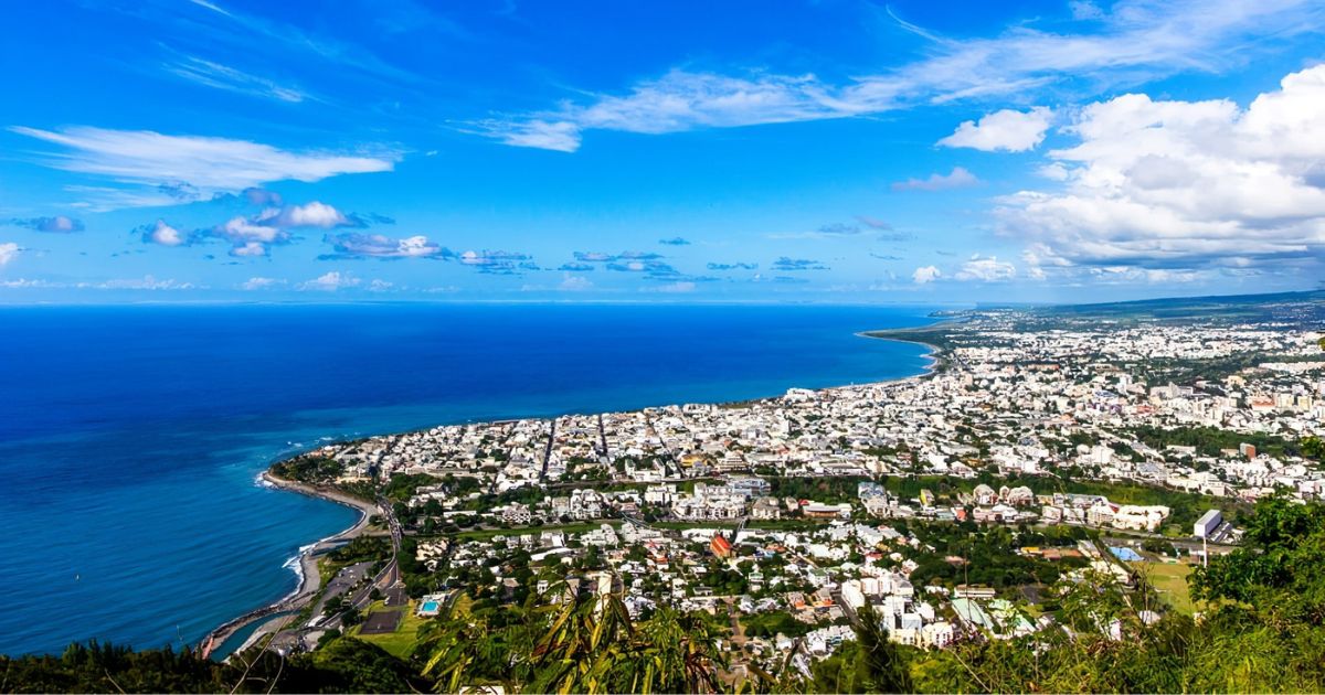 A panoramic view of Saint-Denis from the hillside, its colonial architecture and seafront, Reunion Island