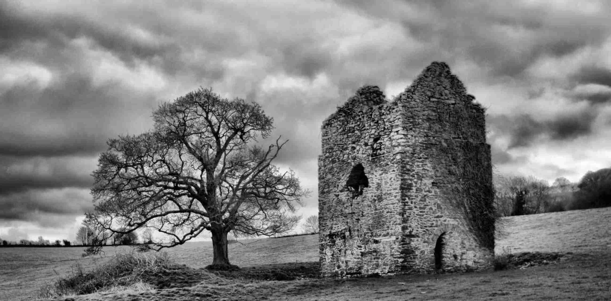 B&W photo of a derelict copper mine building in Somerset, England