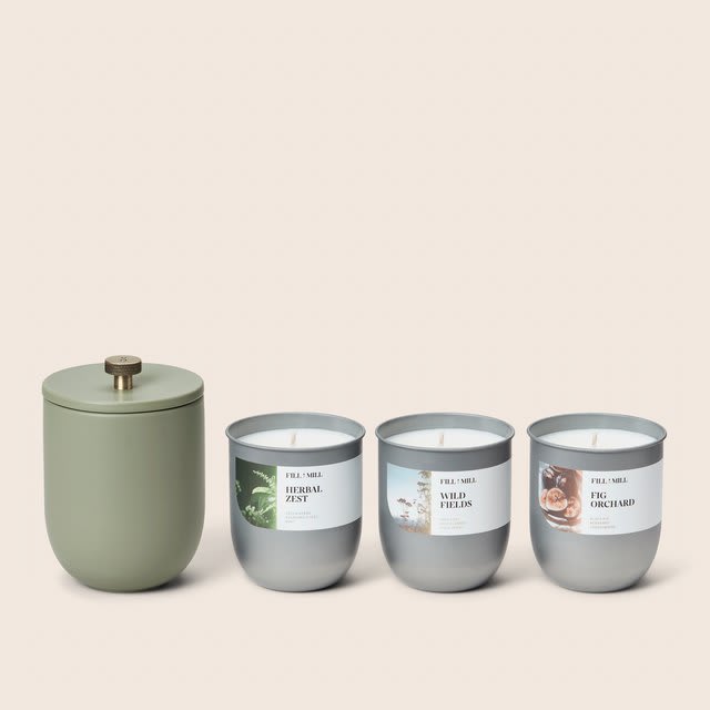 The Fill Mill ceramic Mill with a refill tin and lid, from the brand's Starter Set listing.