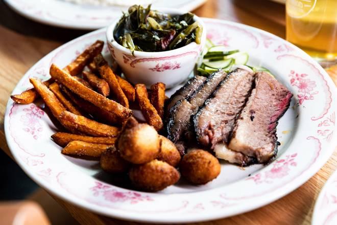 Smoked brisket and Southern barbecue sides at Midwood Smokehouse in Birkdale Village Huntersville