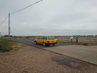 YELLOW 1991 FORD ESCORT L 5SPD - Photo 3