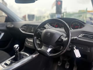 Interior shot of 2015 PEUGEOT 308 ACTIVE SW with touchscreen