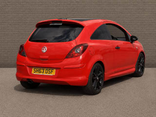 Interior view of 2013 Vauxhall Corsa, manual controls