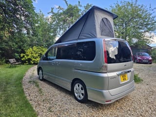 Engine bay of Nissan Serena Highway Star campervan