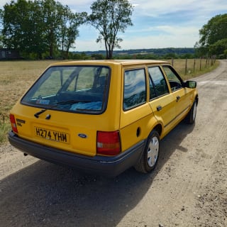 YELLOW 1991 FORD ESCORT L 5SPD - Photo 1