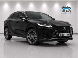 Interior cabin shot of the 2024 Lexus RX with full leather seats and infotainment display