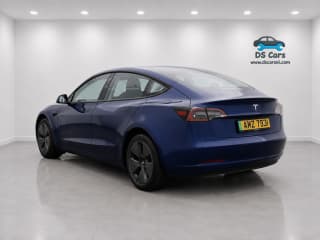 Side profile of the Blue Tesla Model 3 Long Range RWD