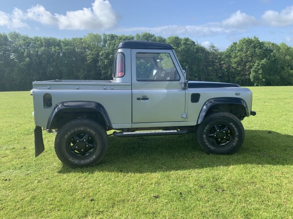 SILVER AND BLACK 2006 LAND ROVER DEFENDER 90 TD5