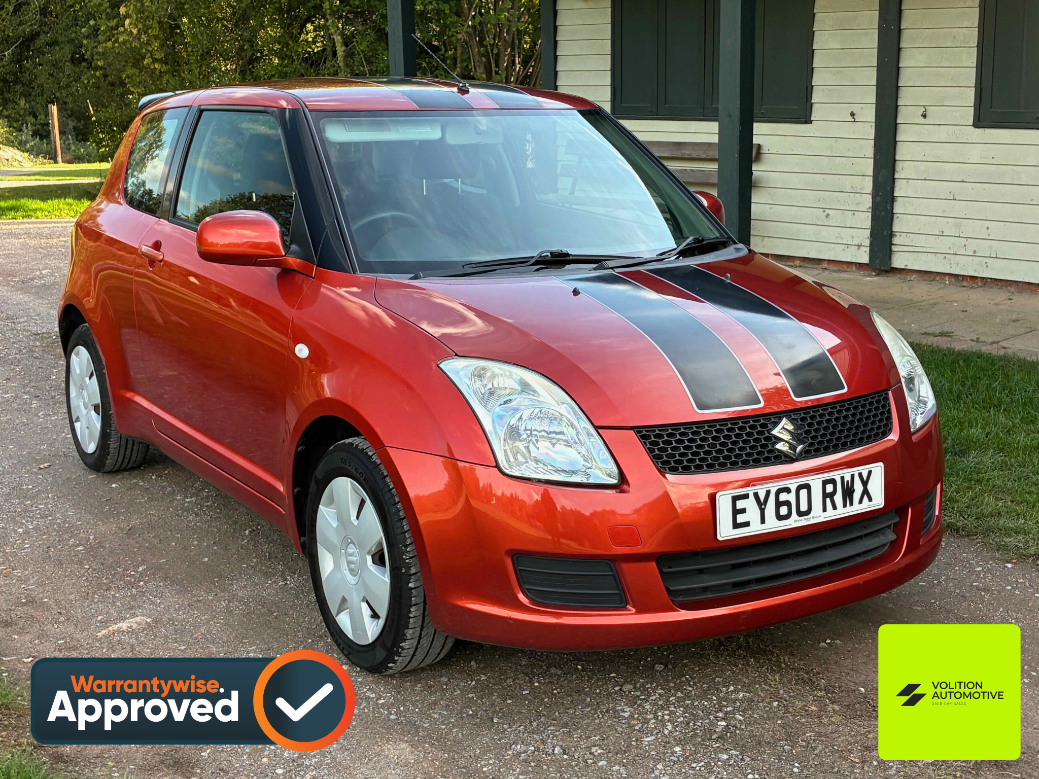 ORANGE 2010 SUZUKI SWIFT SZ2