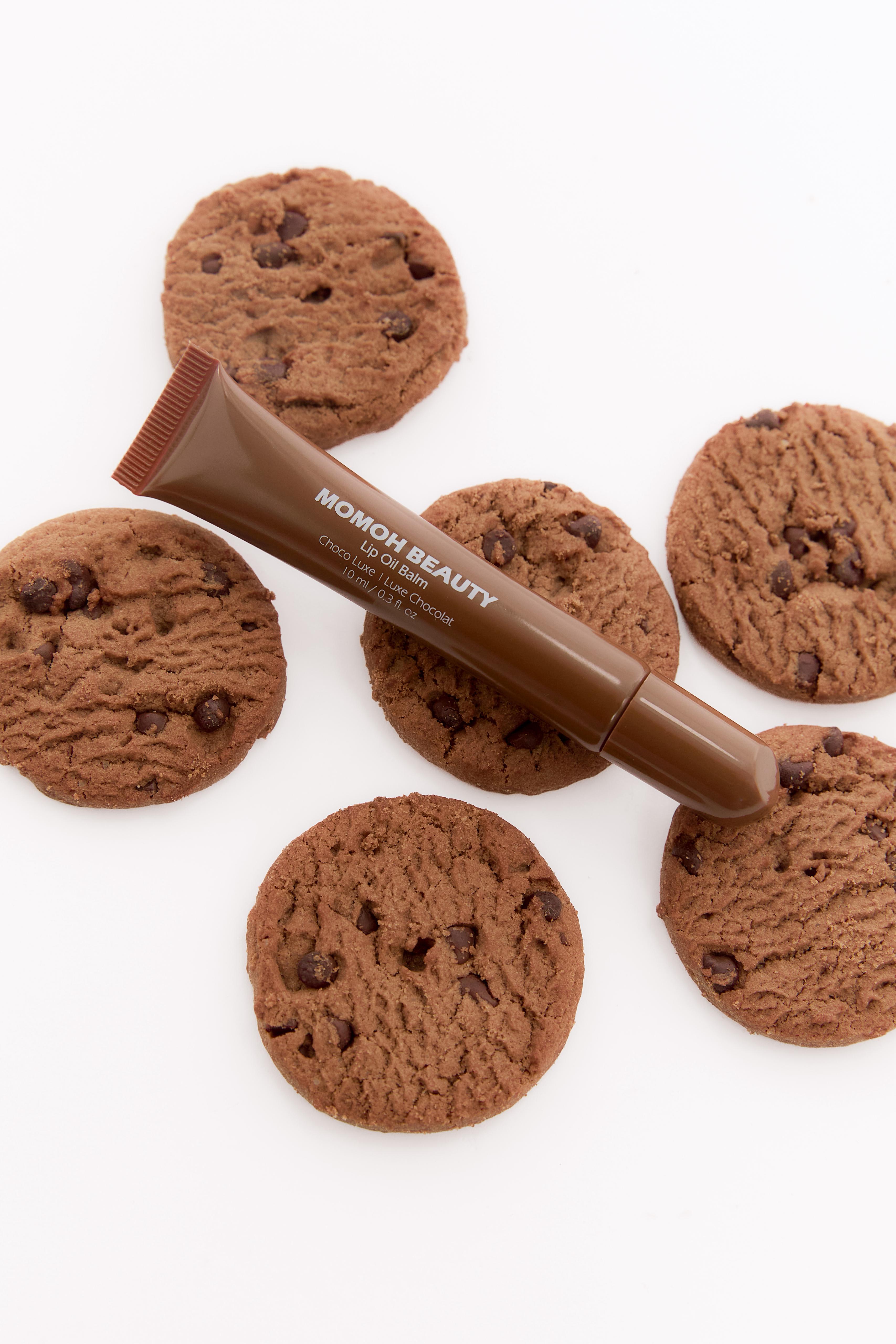 Brown Lip Oil Flatlay with Cookies