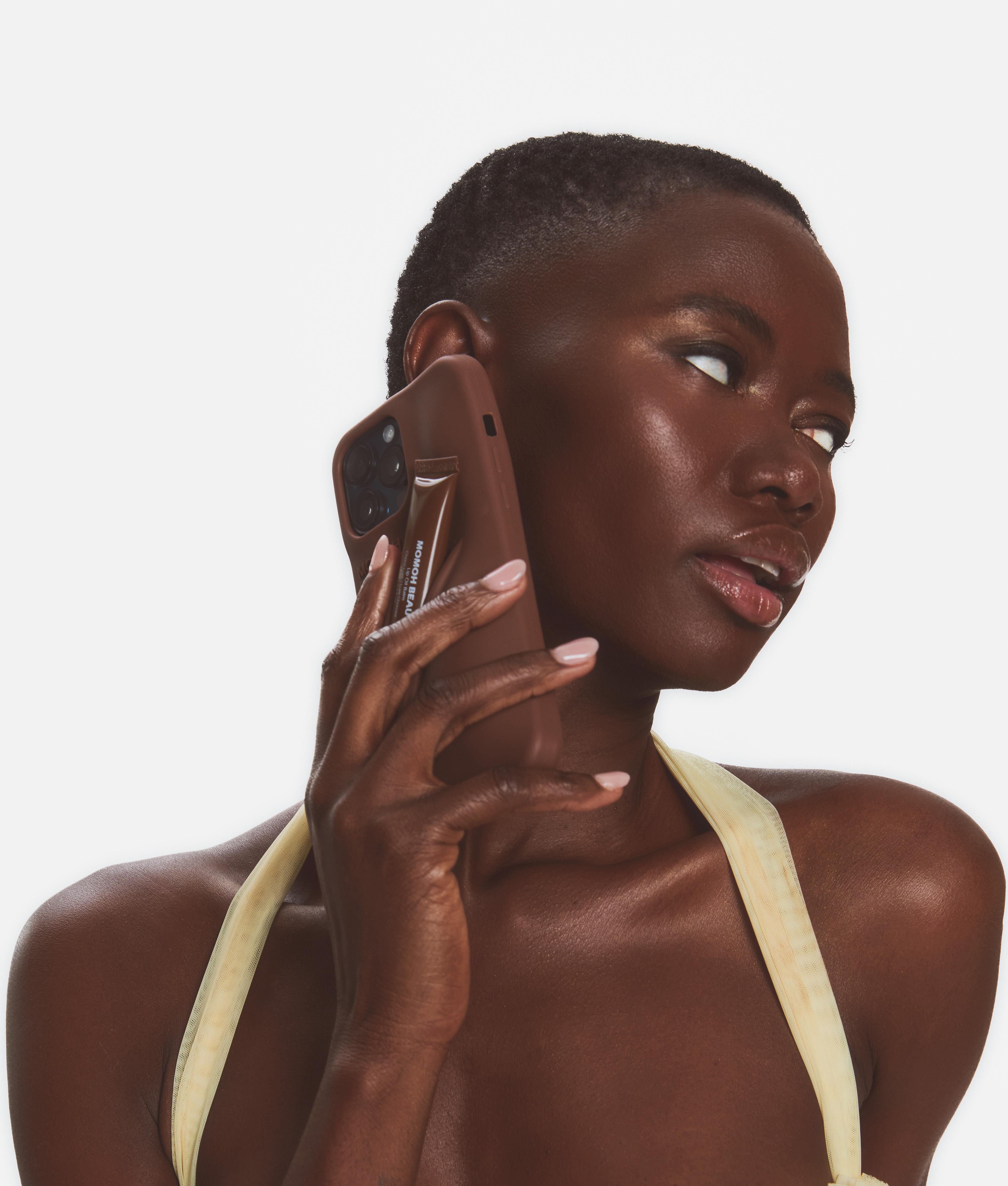 Model Using Brown Pouch