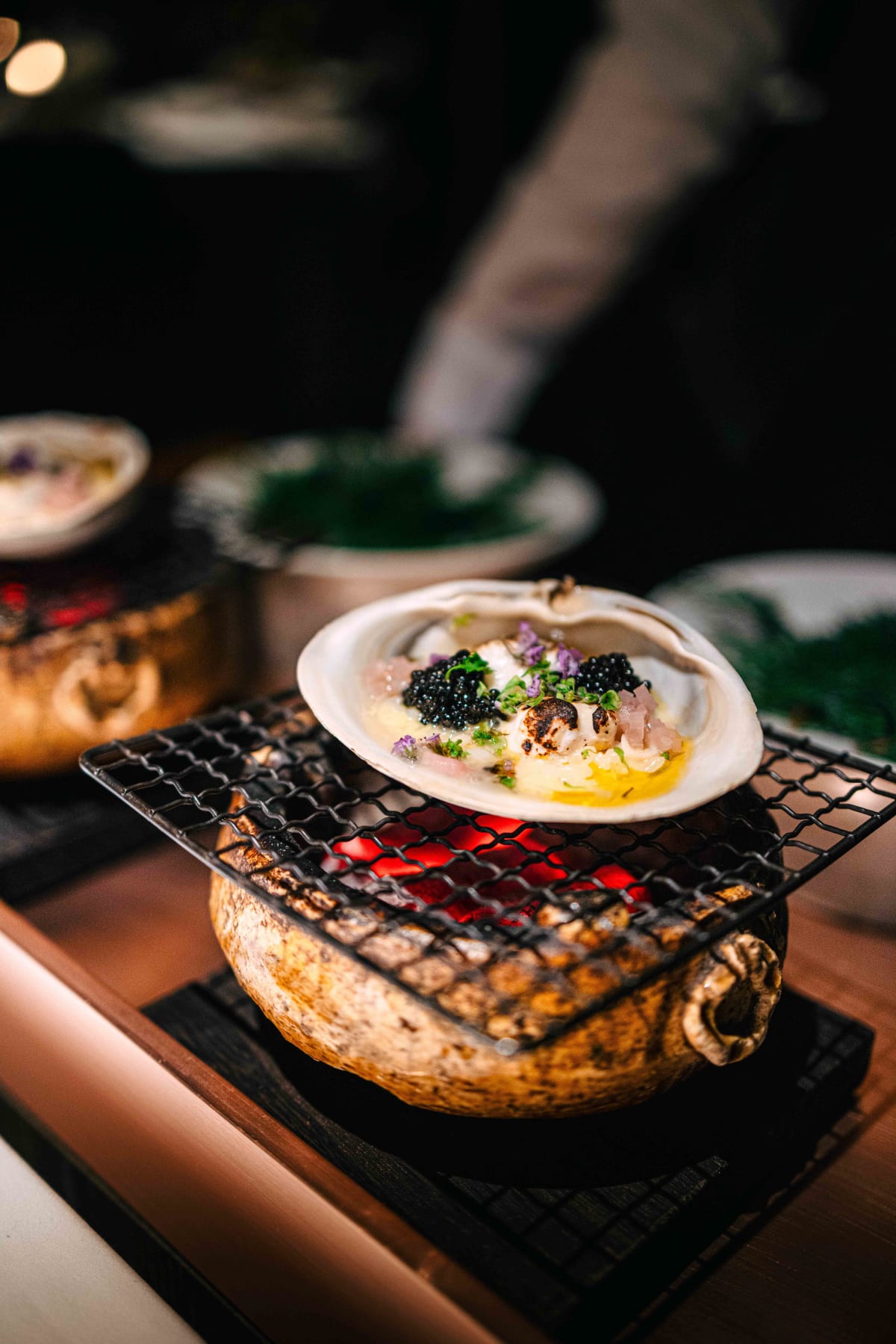 L'Effervescence, Tokyo: the risotto finished over a brazier at the table