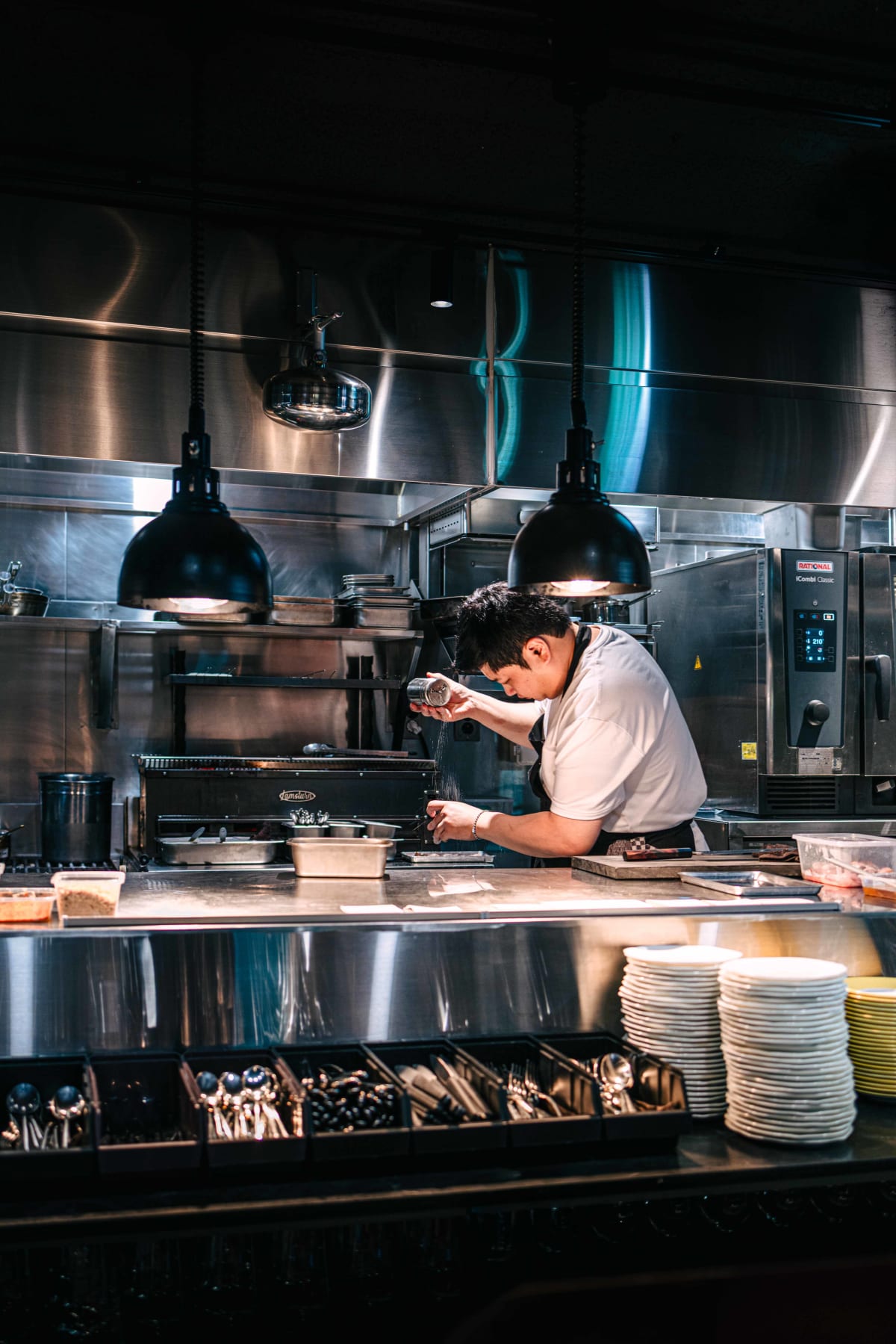 Bistronomy Notre, Seoul: chef Yoon Nam-no seasoning at the pass