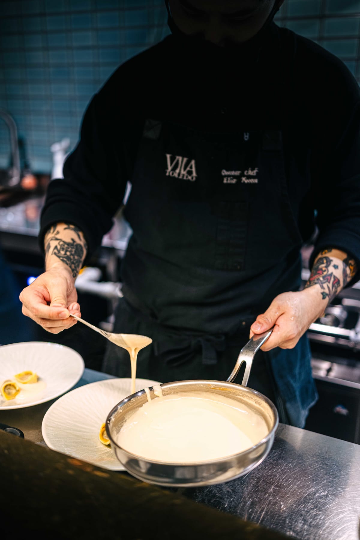 Via Toledo, Seoul: the chef finishing the ravioli with shaved truffle