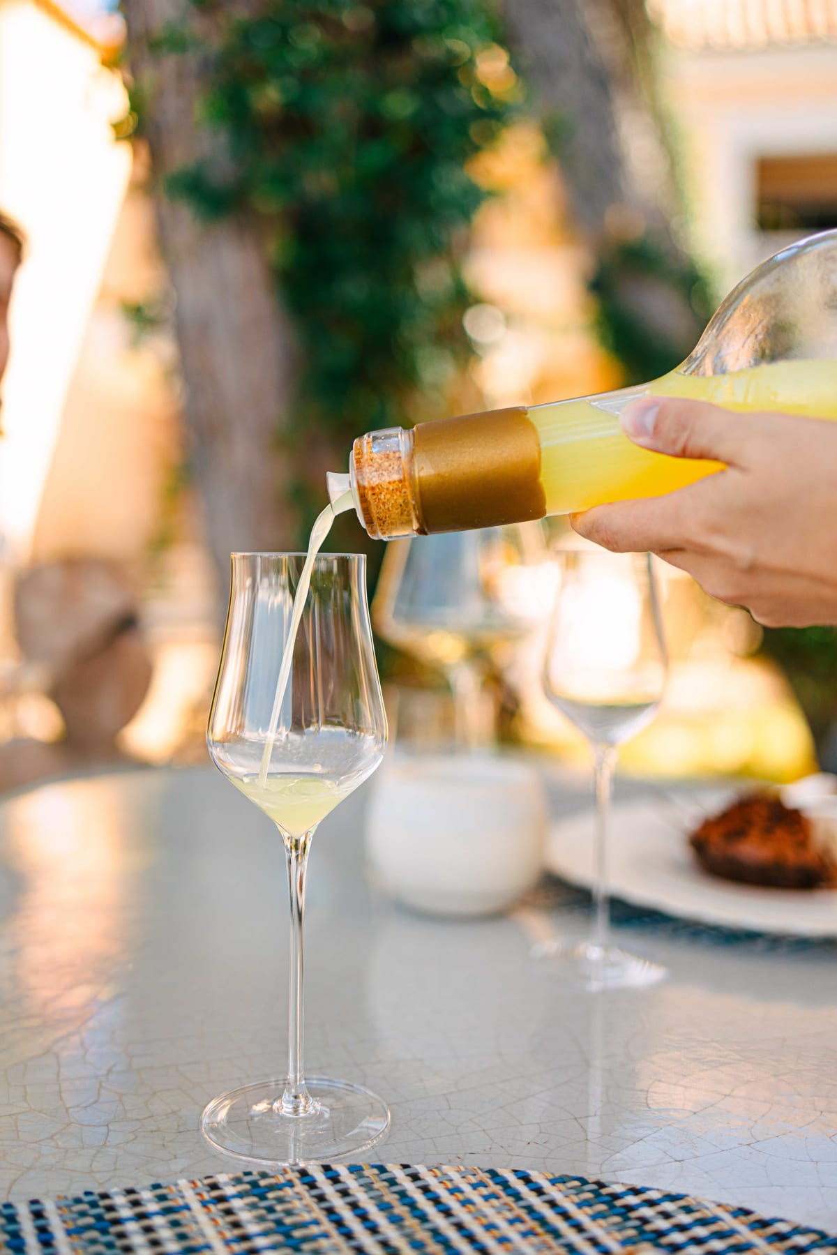 La Terrasse, Saint-Tropez: the lemon liqueur being poured