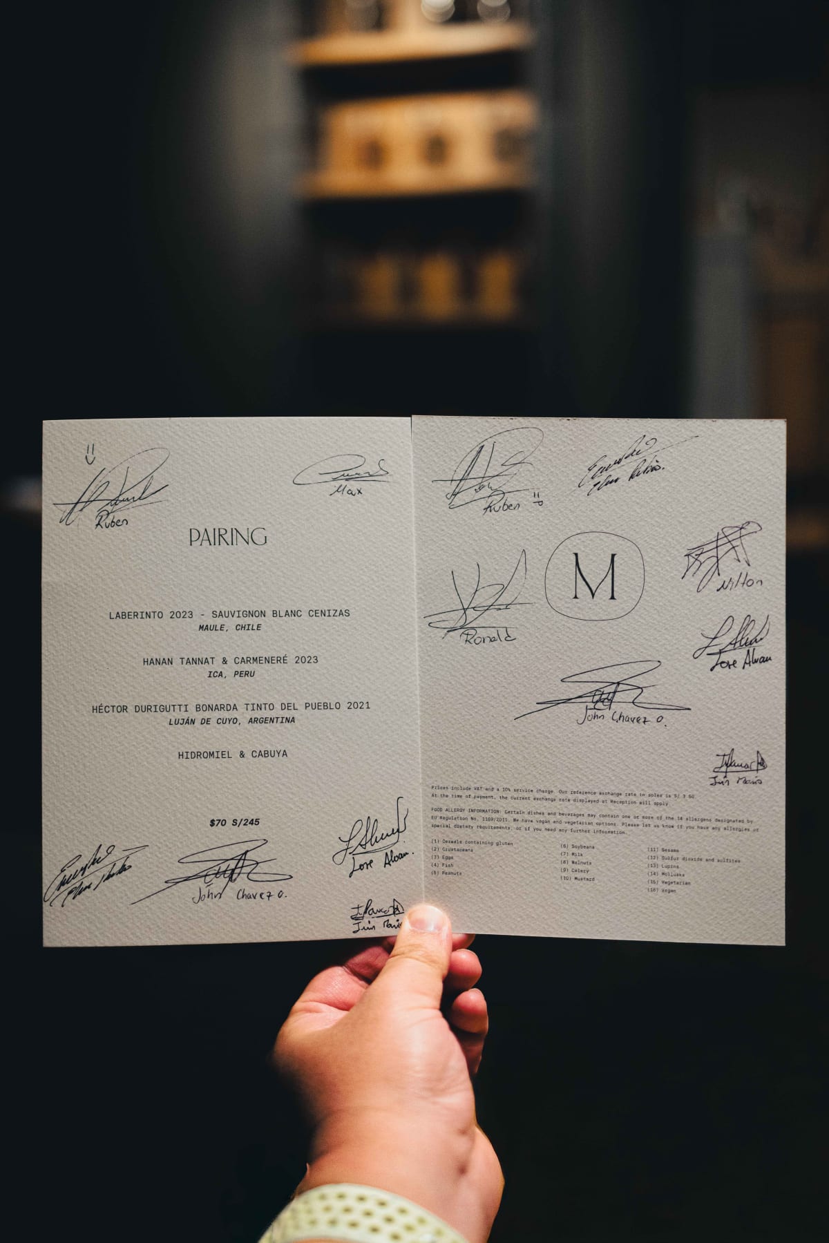 Mauka, Cusco: the pairing card signed by the staff