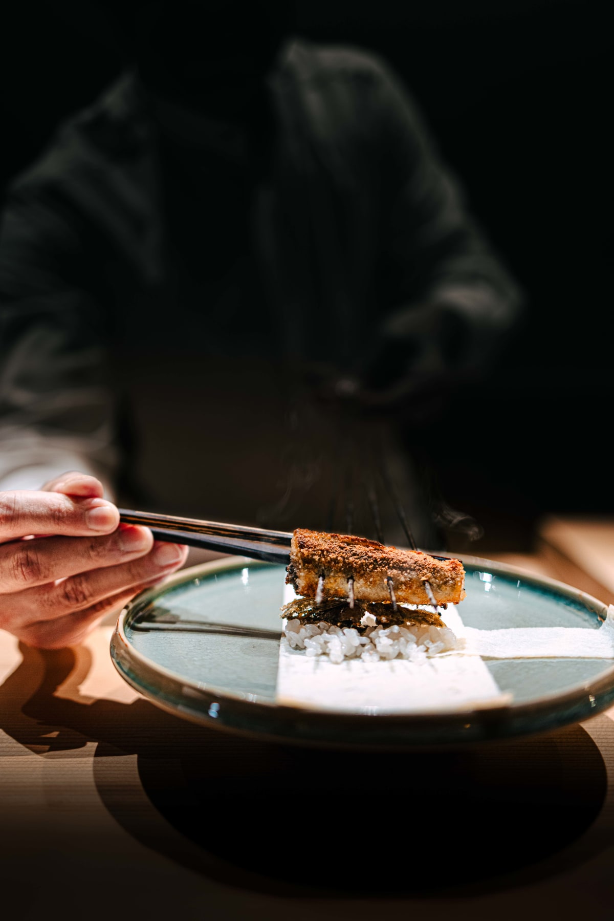 Myoujyaku, Tokyo: the whole grilled mehikari being placed on top