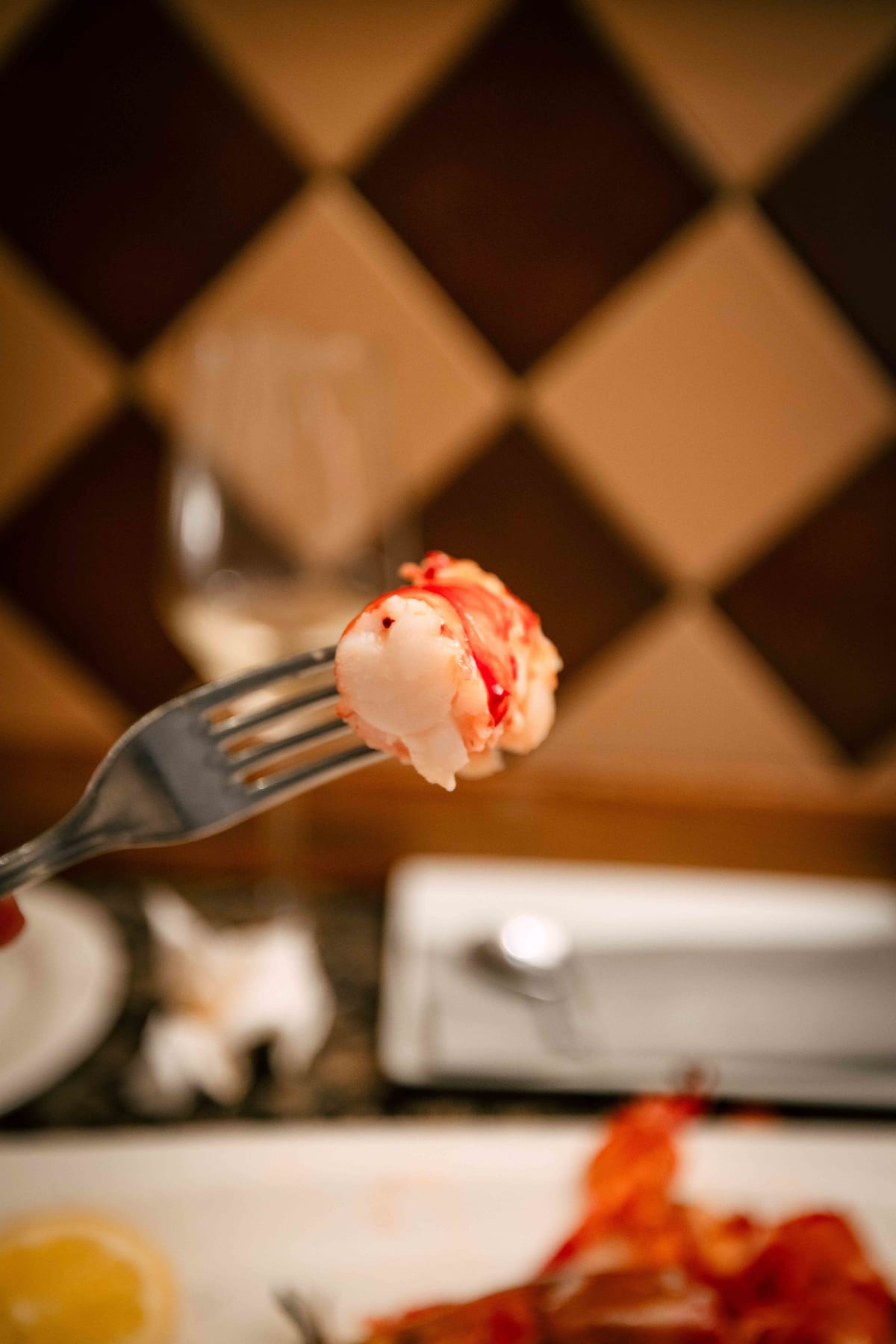 Ganbara, San Sebastián: a piece of the tail meat lifted on a fork