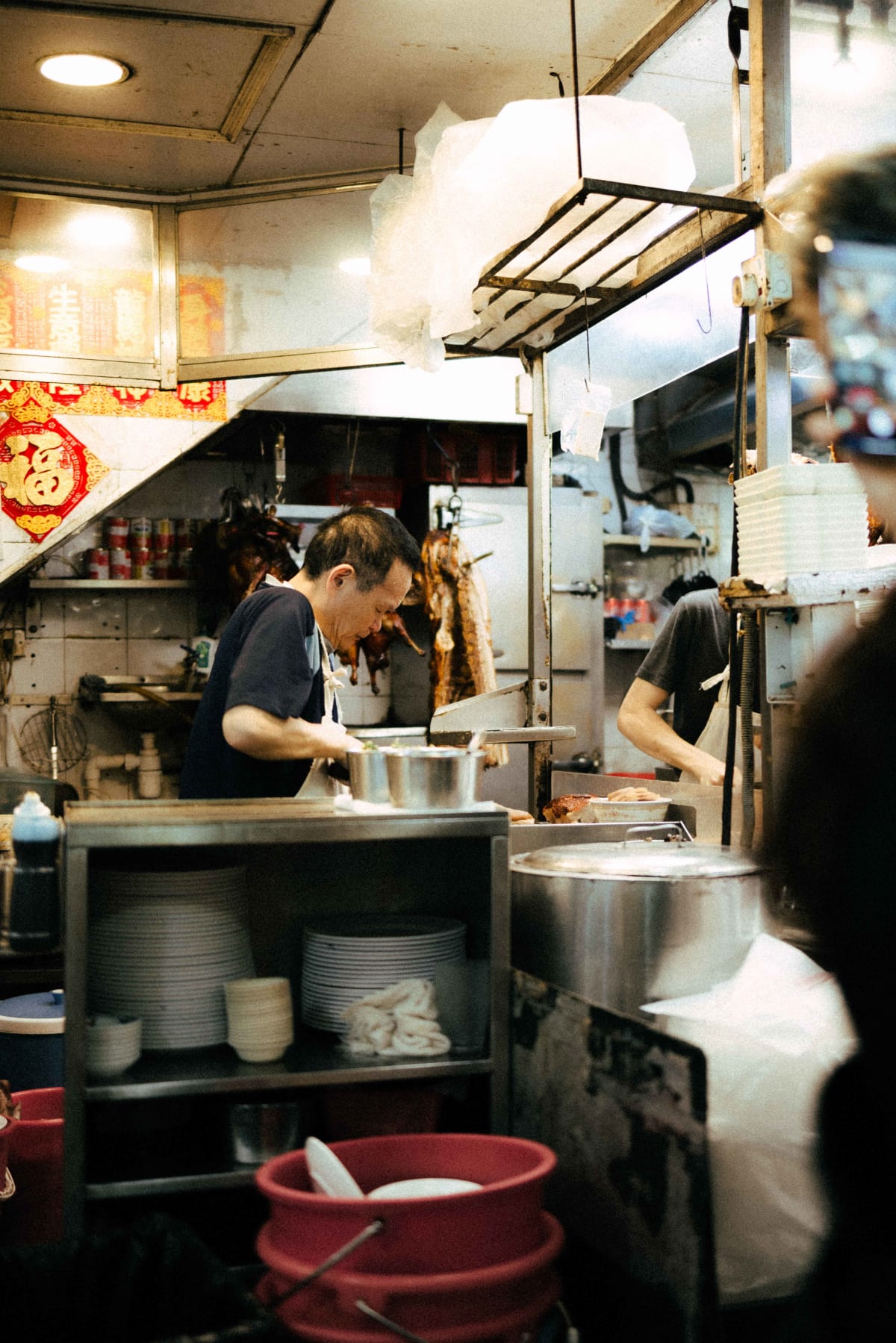 Joy Hing Roasted Meat, Hong Kong: staff preparing an order