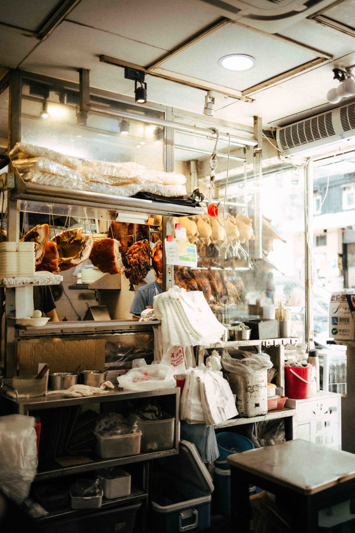 Joy Hing Roasted Meat, Hong Kong: char siu, chicken and goose hanging in the kitchen