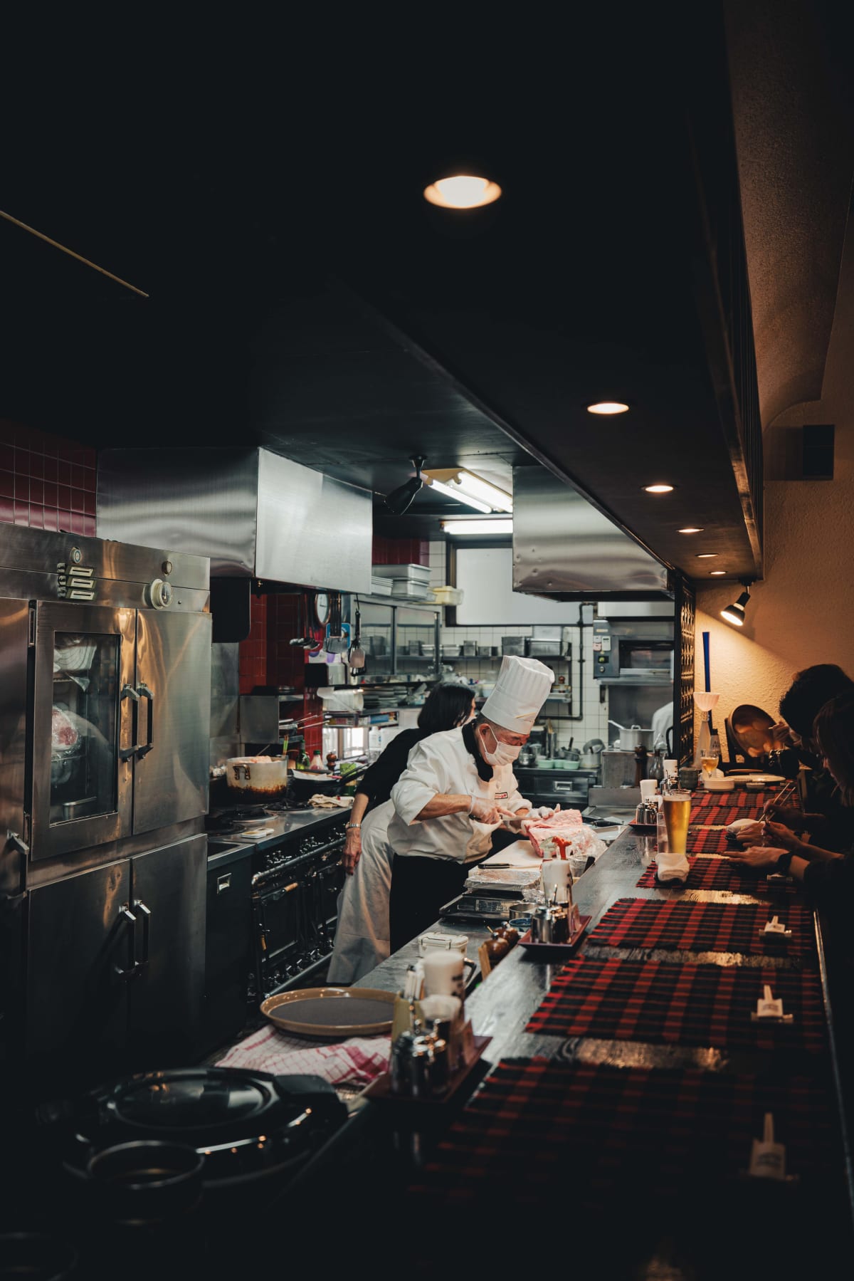 Kuishinbo Yamanaka, Kyoto: the chef and his assistant working behind the counter