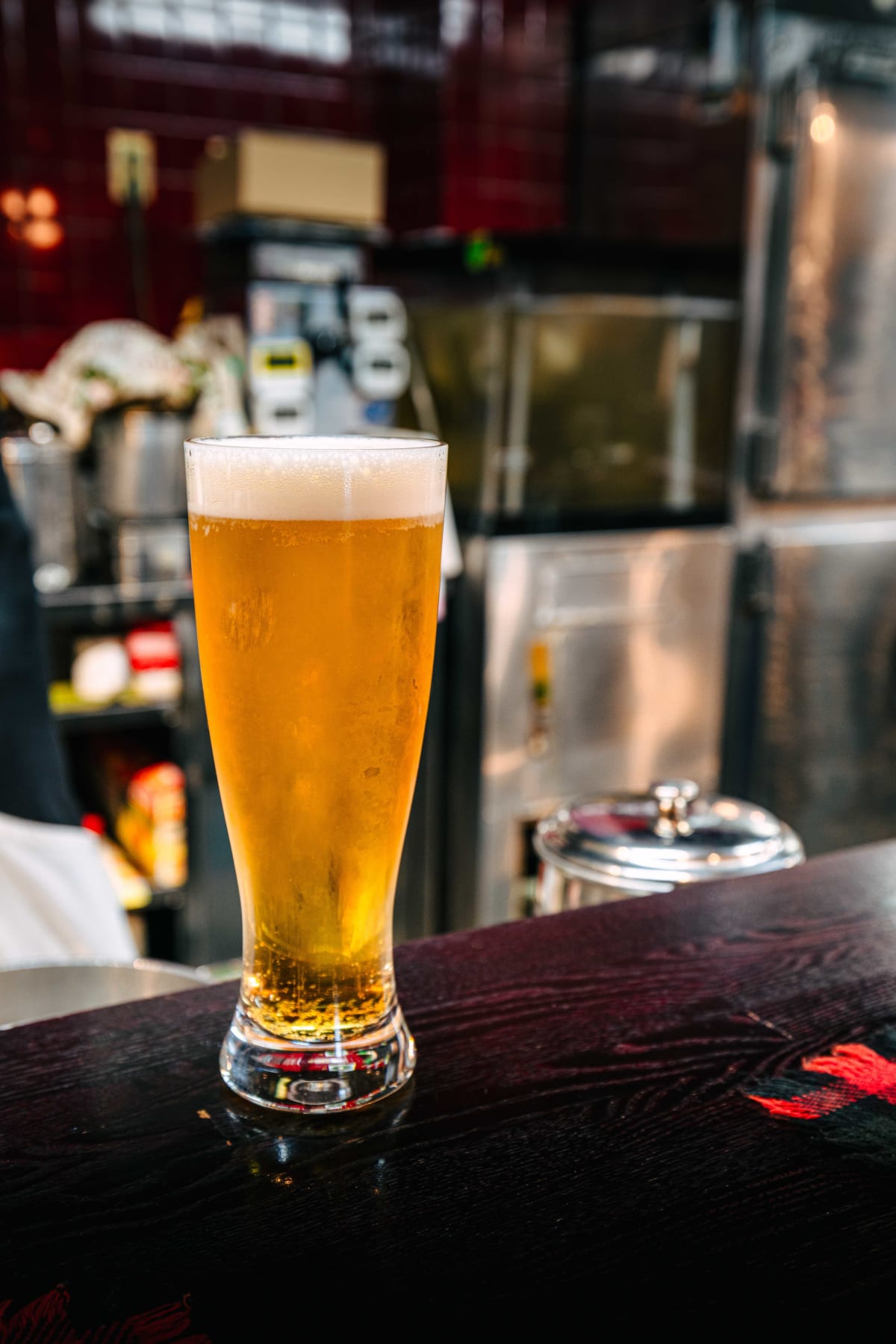 Kuishinbo Yamanaka, Kyoto: a glass of draft beer on the counter