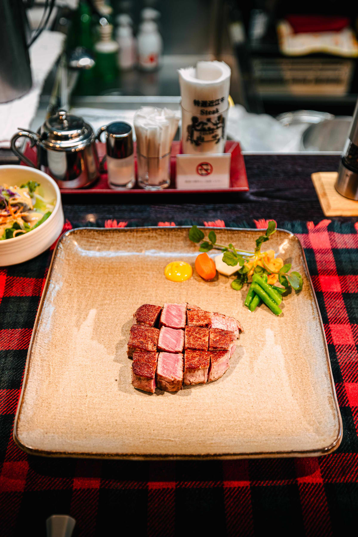Kuishinbo Yamanaka, Kyoto: the fillet steak plated with carrot, green beans and mustard