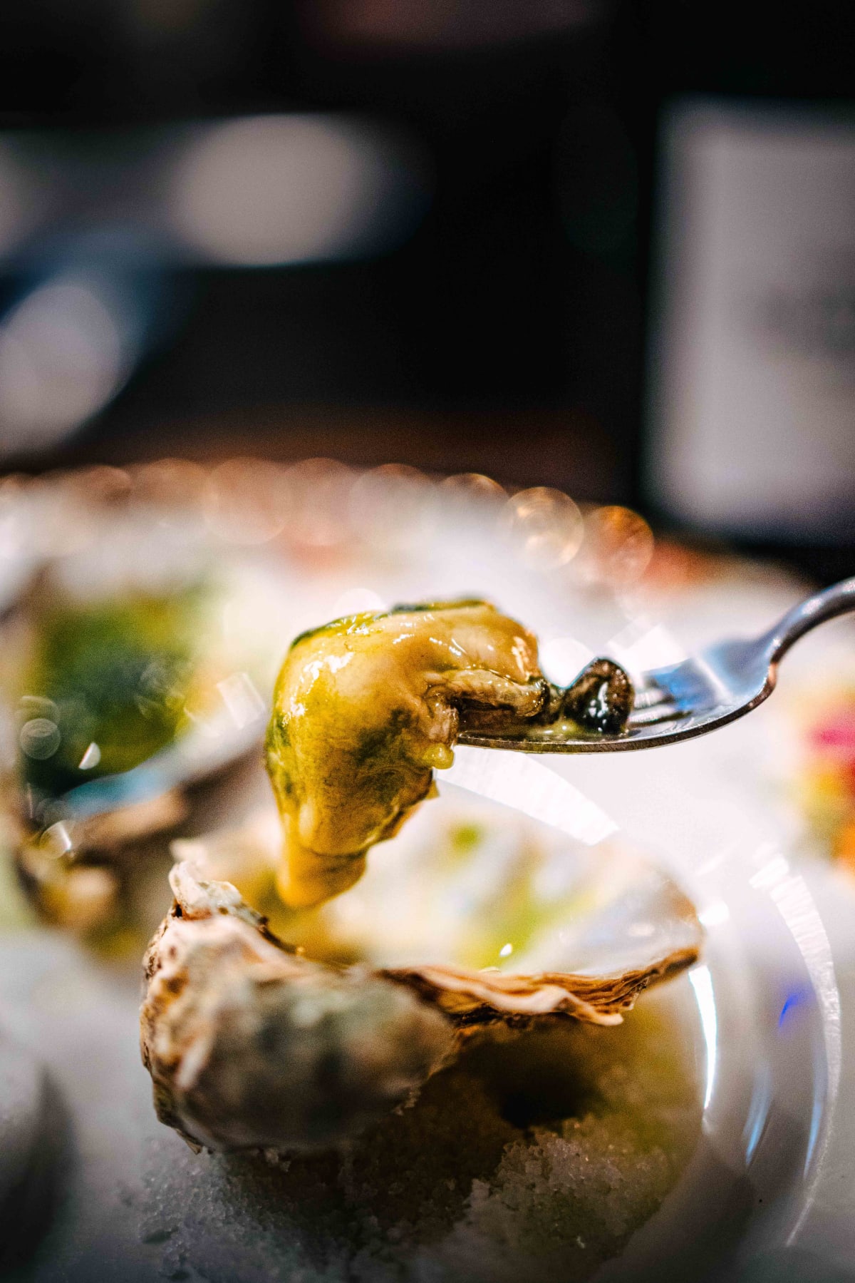 Bistro de la Mer, Amsterdam: an oyster lifted from its shell on a fork