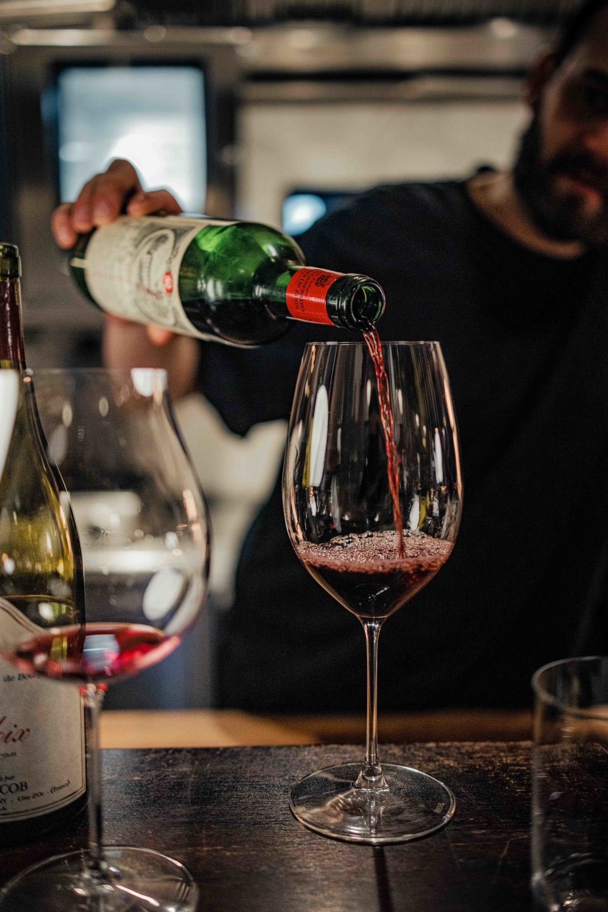 Bistro de la Mer, Amsterdam: the Bordeaux being poured beside the glass of Ladoix