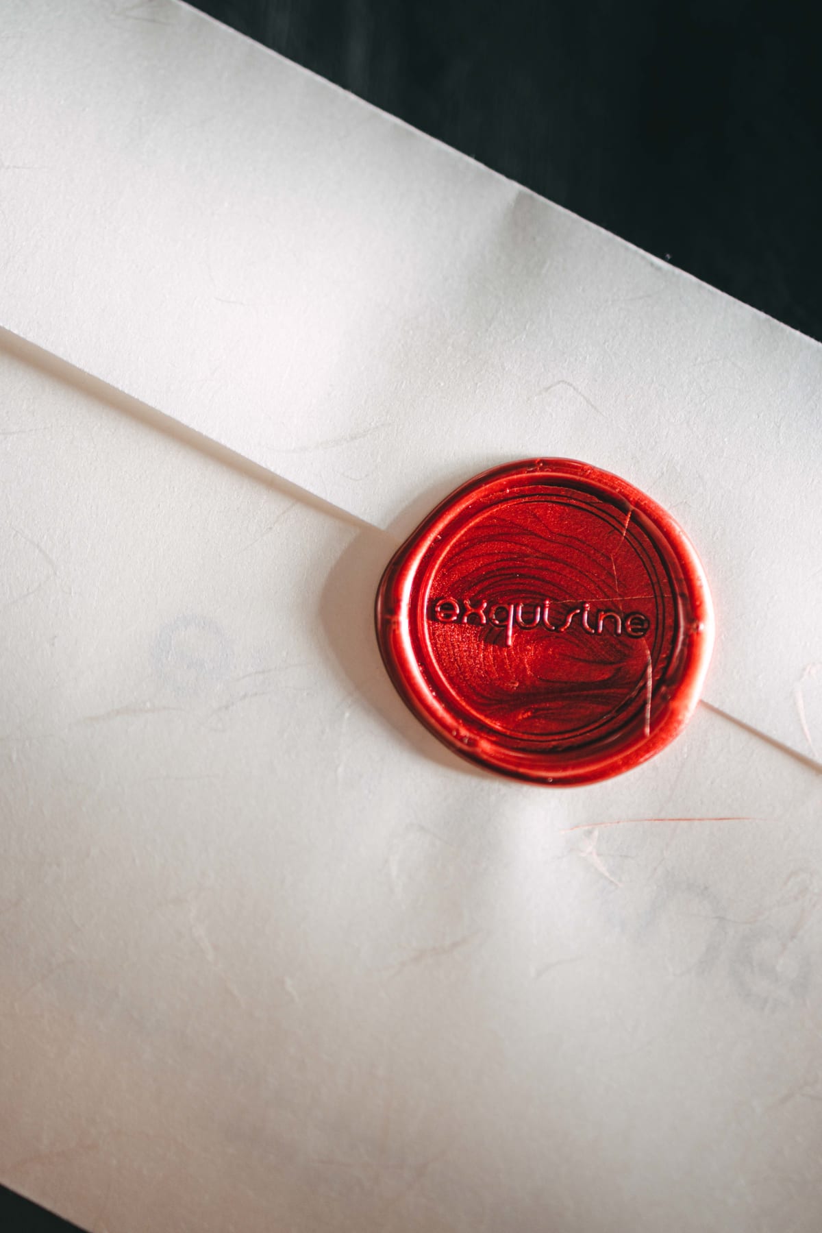 Exquisine, Seoul: the wax seal with the restaurant's name, from another angle