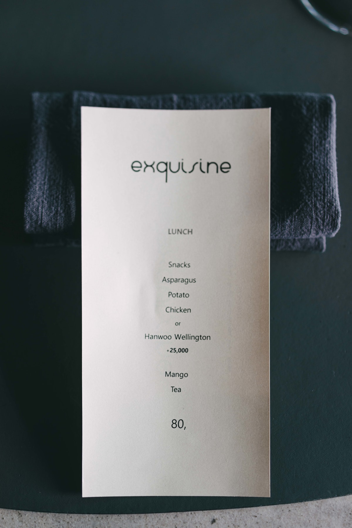 Exquisine, Seoul: the lunch menu card listing Snacks, Asparagus, Potato, Chicken or Hanwoo Wellington, Mango and Tea