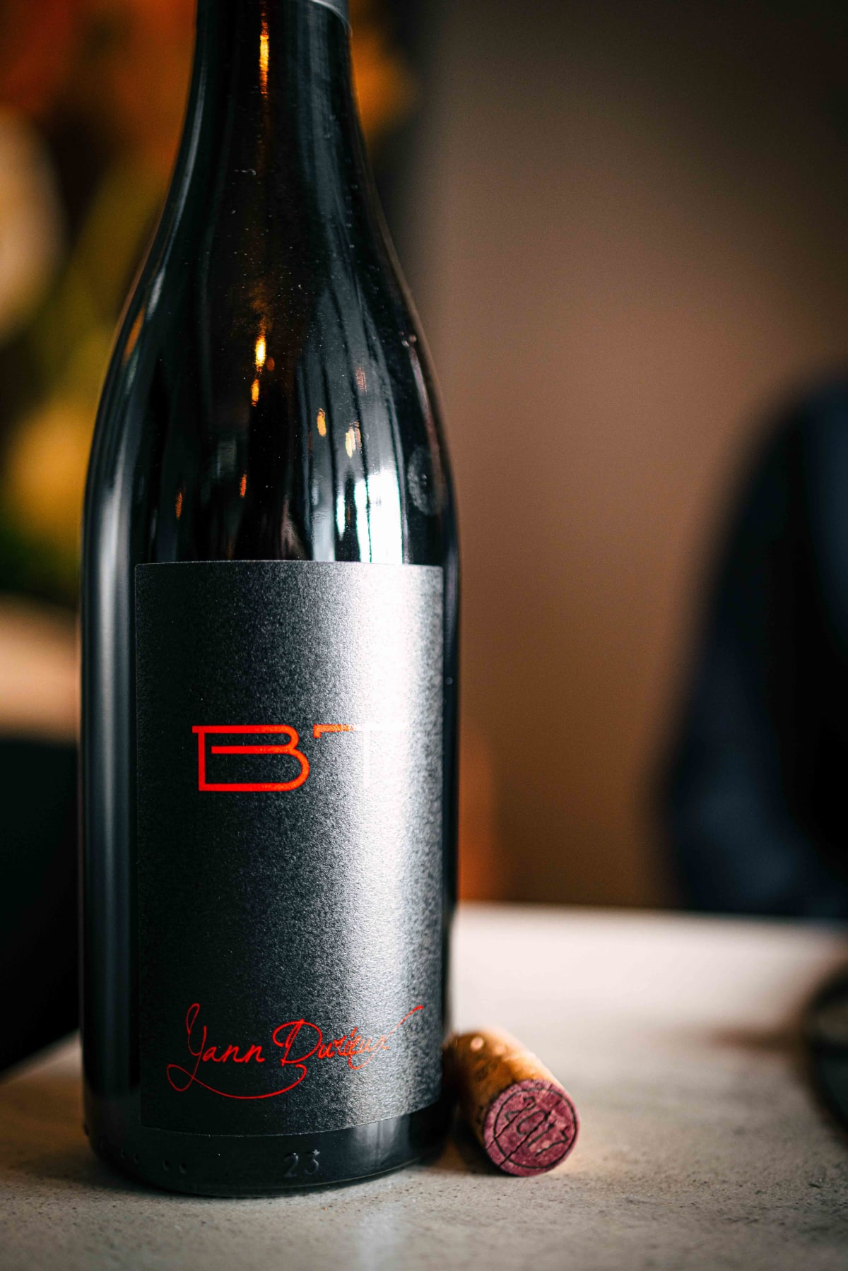 Exquisine, Seoul: the BT label up close, the red letters BT and Yann Durieux's signature, with the cork beside it