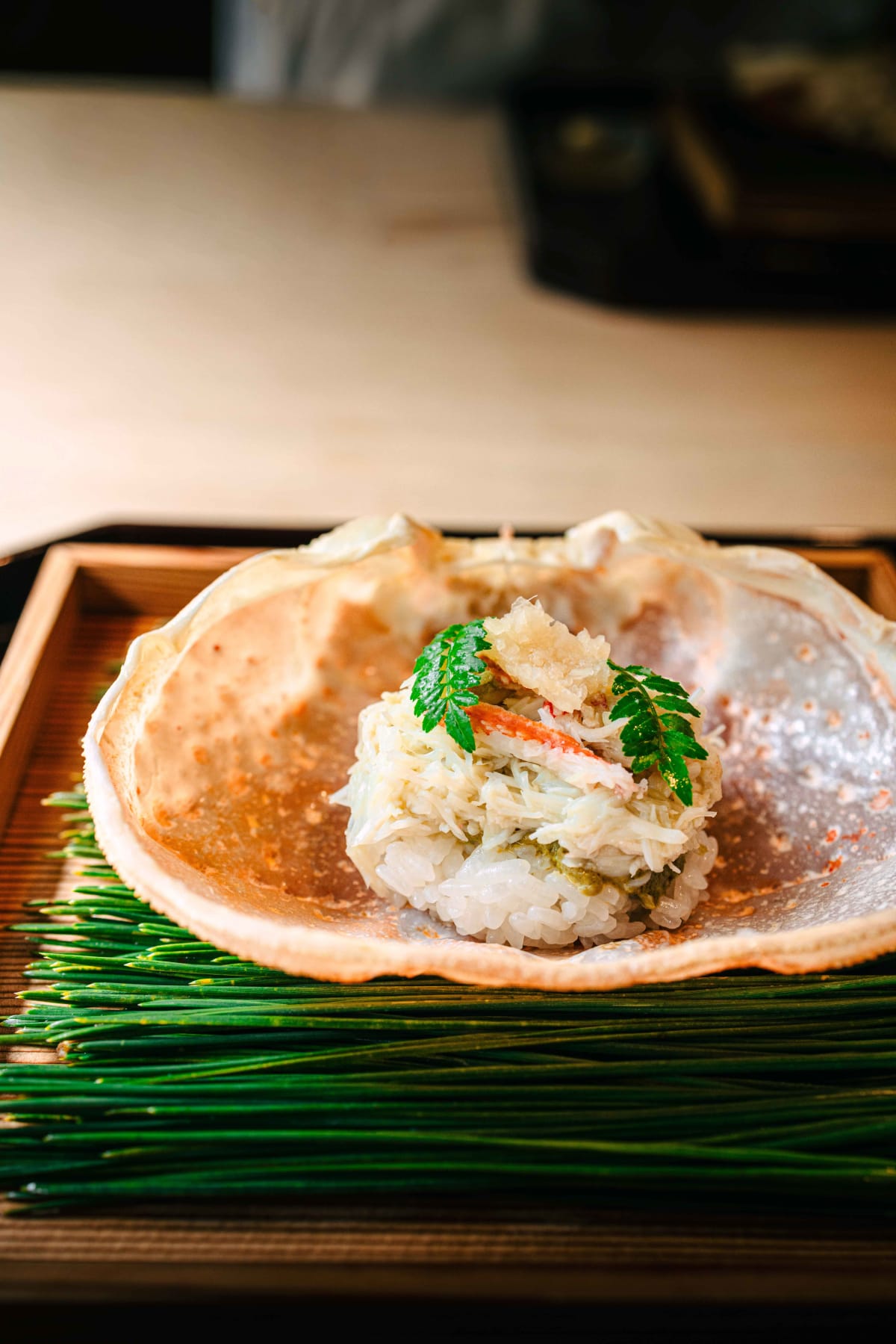 Matsukawa, Tokyo: crab meat over shari in the crab's own shell, on a bed of pine needles