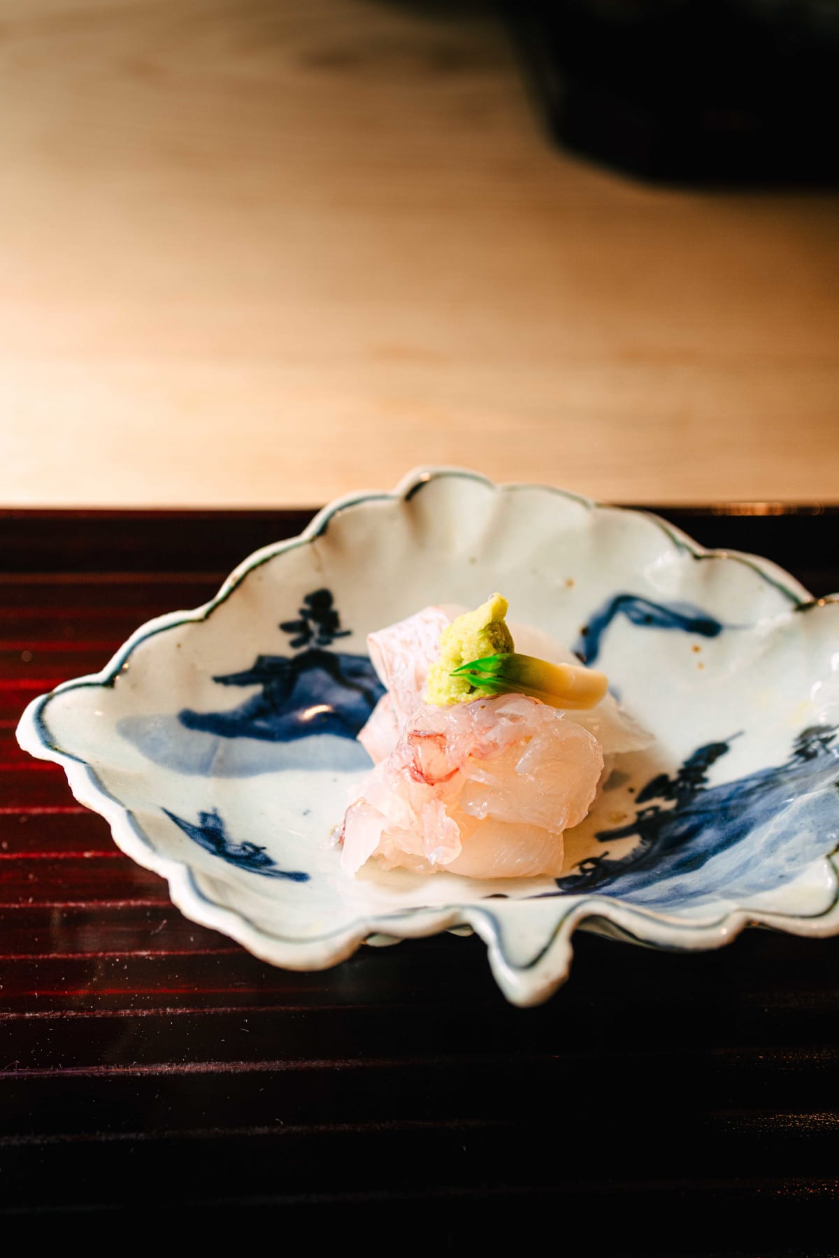 Matsukawa, Tokyo: madai and ise-ebi sashimi with fresh wasabi on a shell-shaped blue and white dish