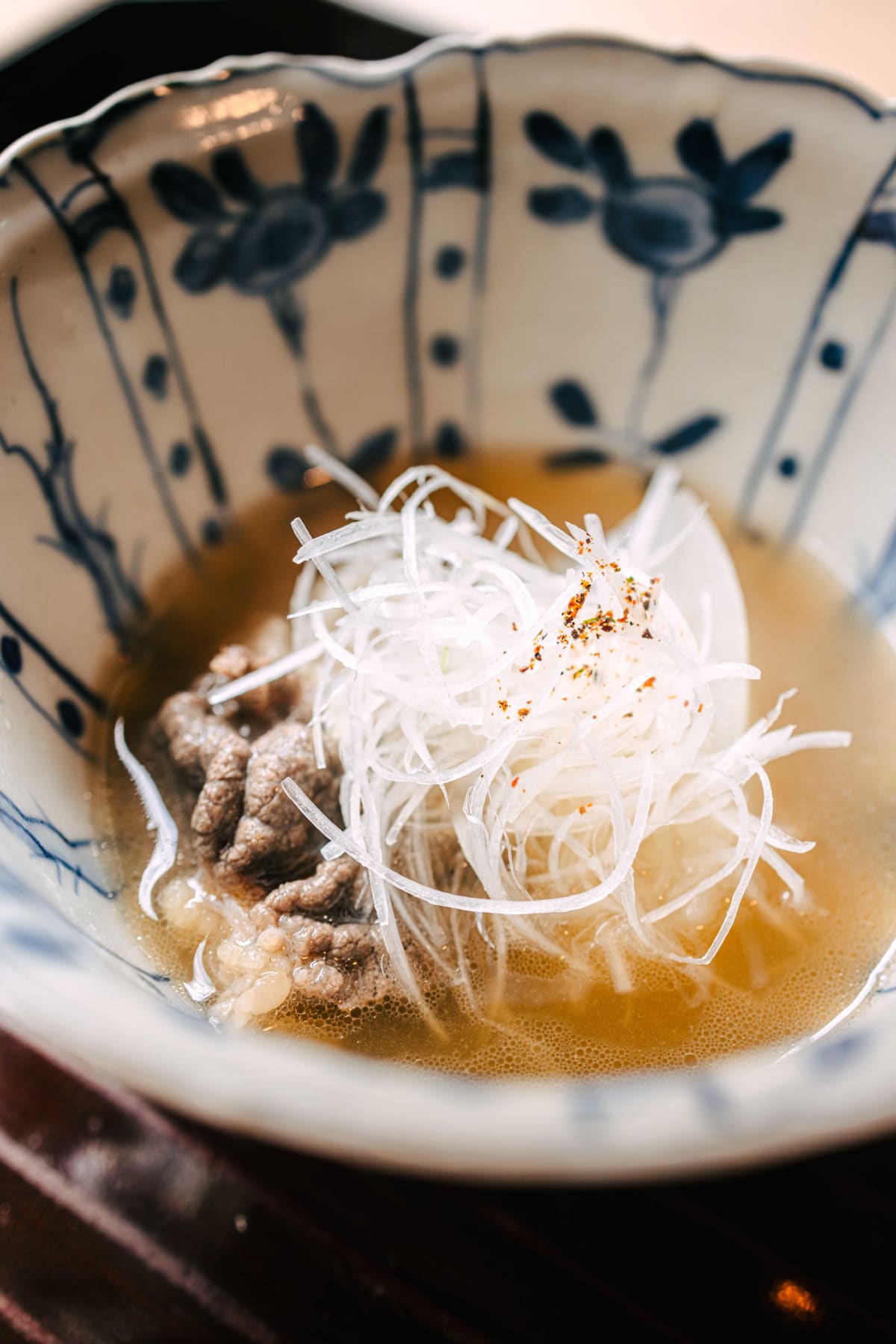Matsukawa, Tokyo: the bear soup up close, a dusting of sansho on the leek