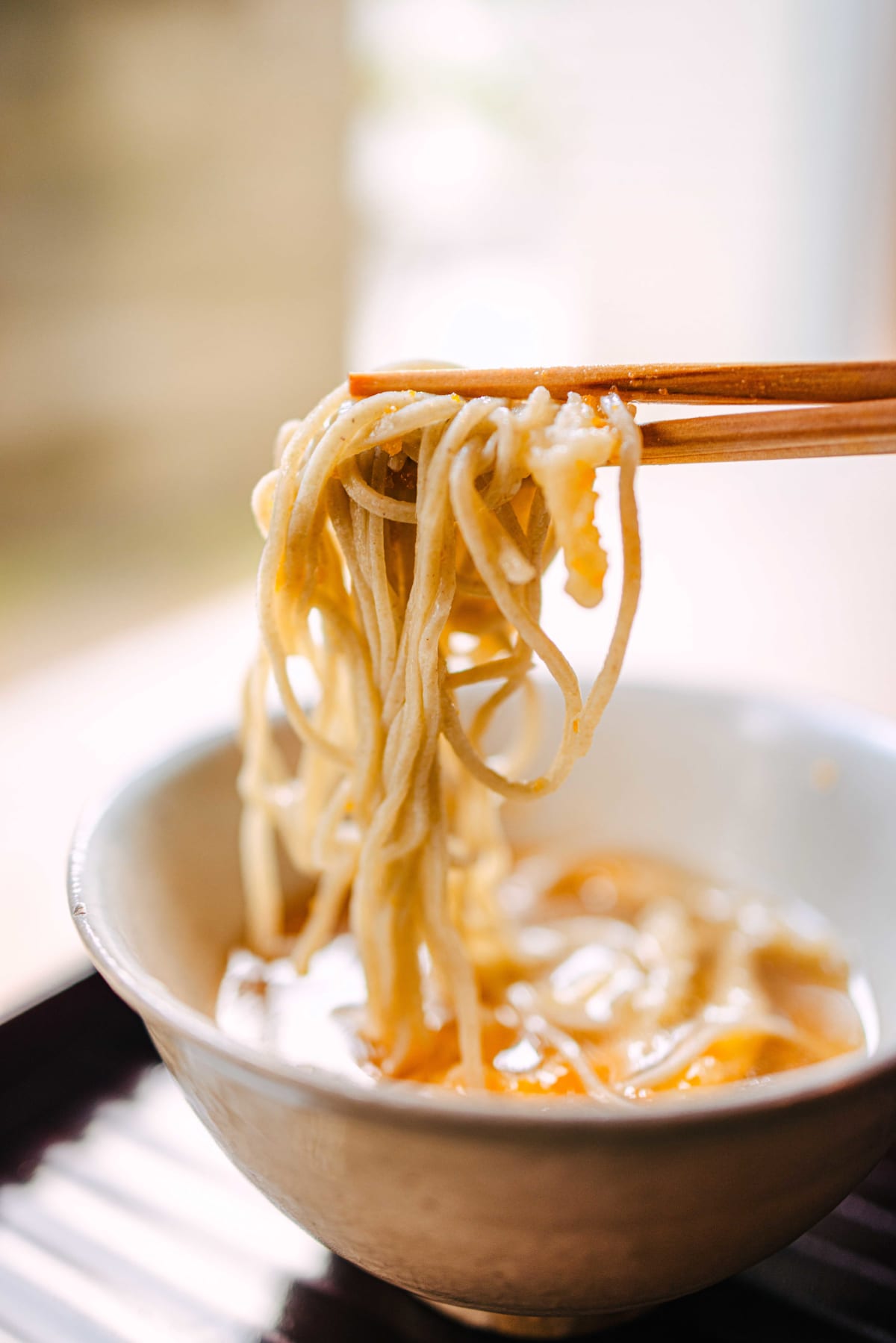 Matsukawa, Tokyo: soba and icefish tempura lifted with chopsticks