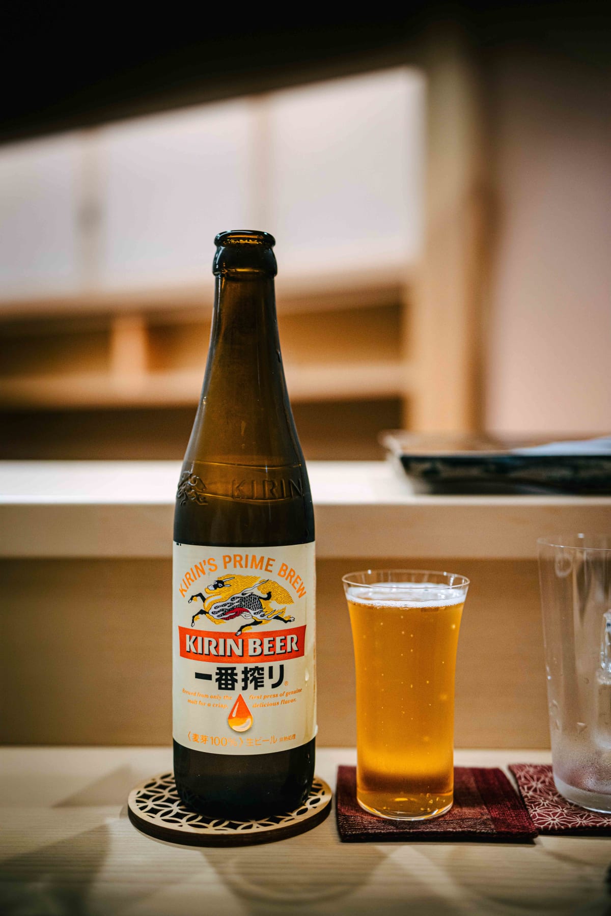 Nihonbashi Kakigaracho Sugita, Tokyo: a bottle of Kirin Ichiban Shibori beside a poured glass