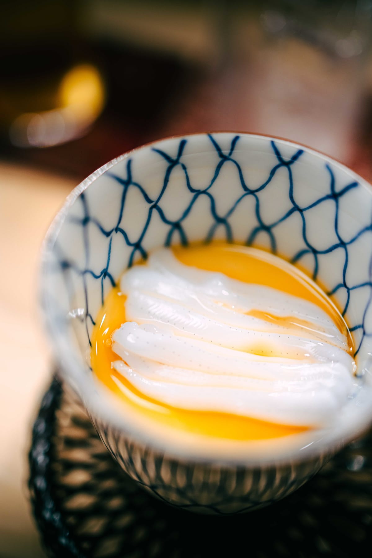 Nihonbashi Kakigaracho Sugita, Tokyo: the noresore lying in neat rows on the custard, then lifted on a lacquer spoon