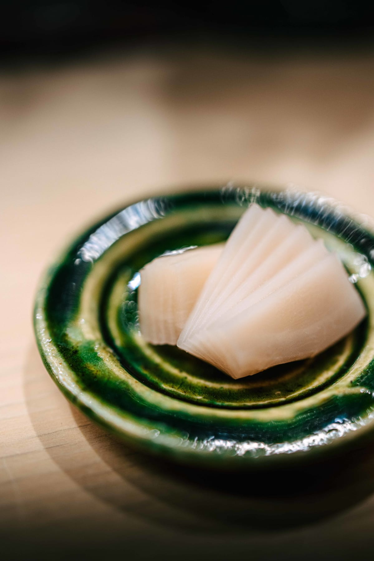 Nihonbashi Kakigaracho Sugita, Tokyo: gari, thin slices of pickled ginger fanned out on a green glazed dish