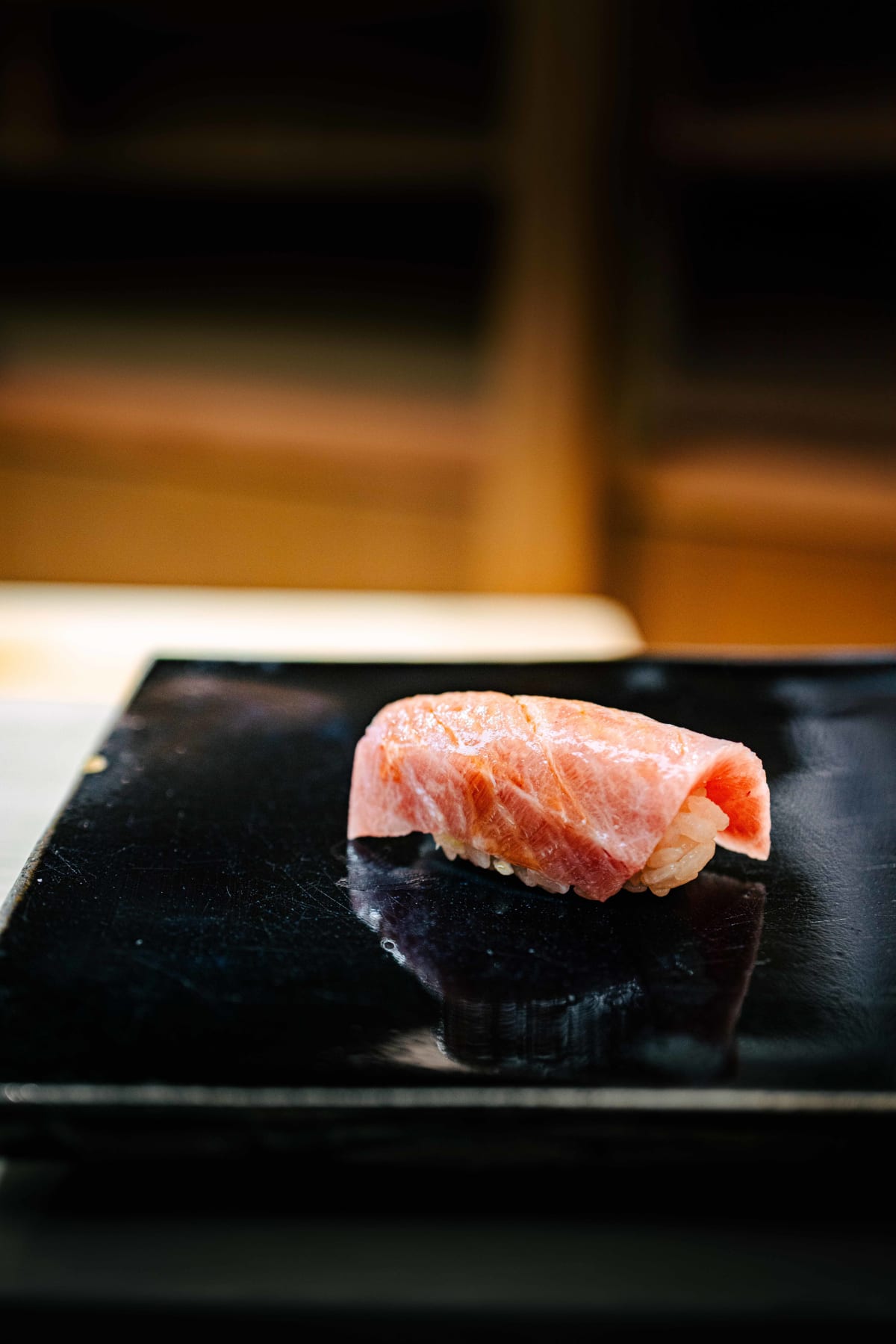 Nihonbashi Kakigaracho Sugita, Tokyo: otoro nigiri, pale pink and laced with fat