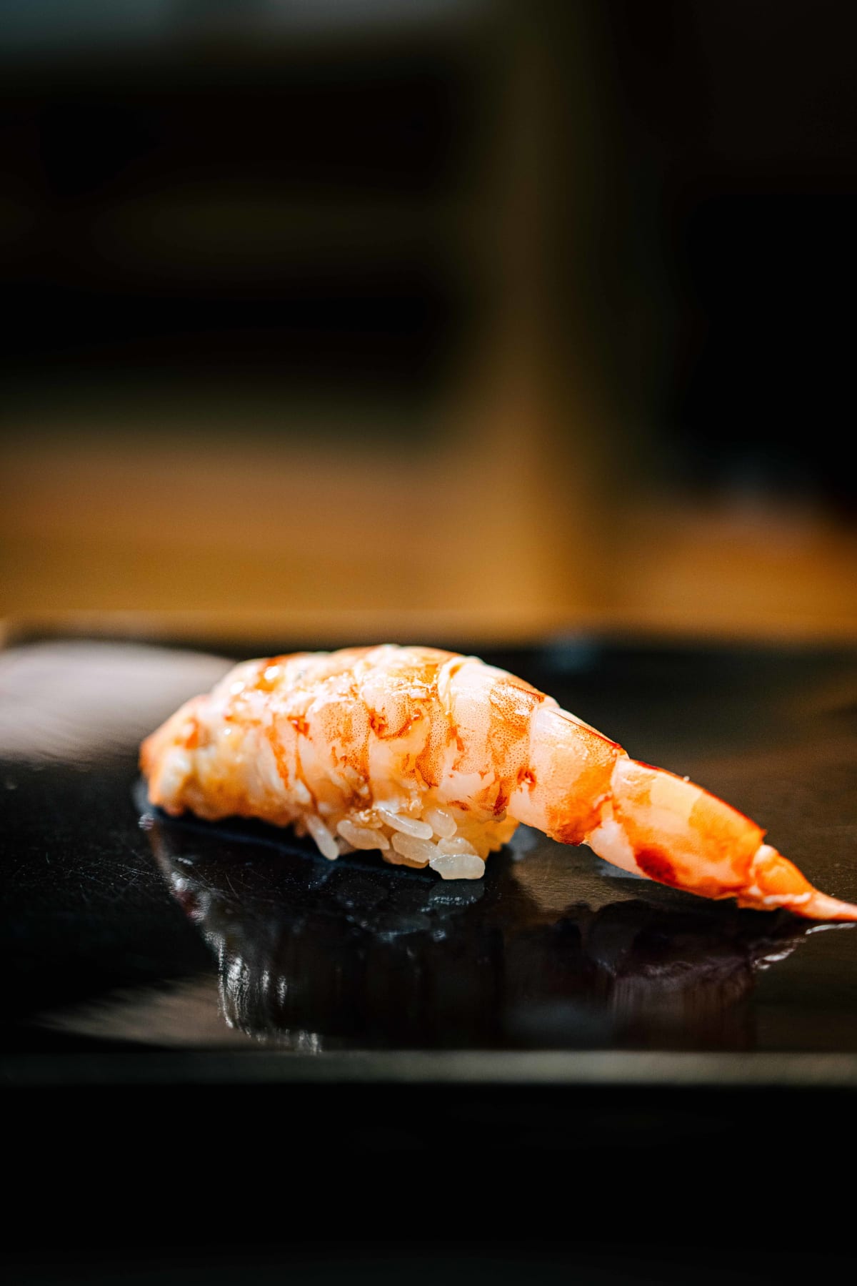 Nihonbashi Kakigaracho Sugita, Tokyo: kuruma ebi nigiri, the striped prawn draped over the shari with its tail still on