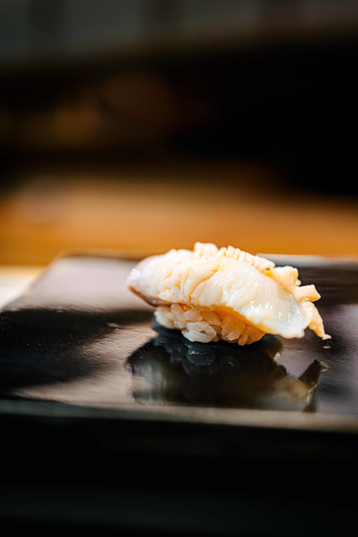 Nihonbashi Kakigaracho Sugita, Tokyo: hokkigai nigiri, pale and frilled at the edge