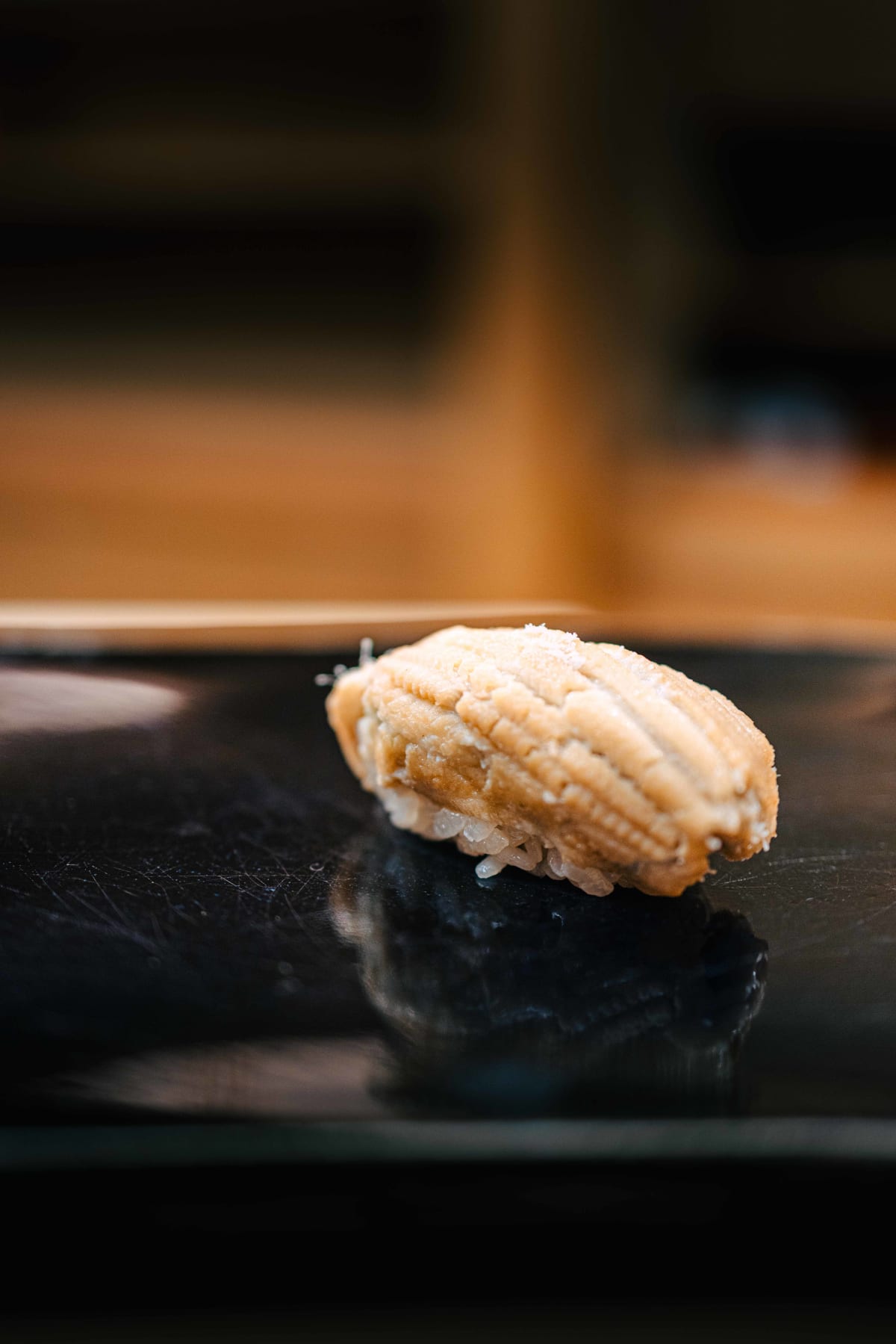 Nihonbashi Kakigaracho Sugita, Tokyo: anago nigiri finished with salt rather than tare, soft and pale