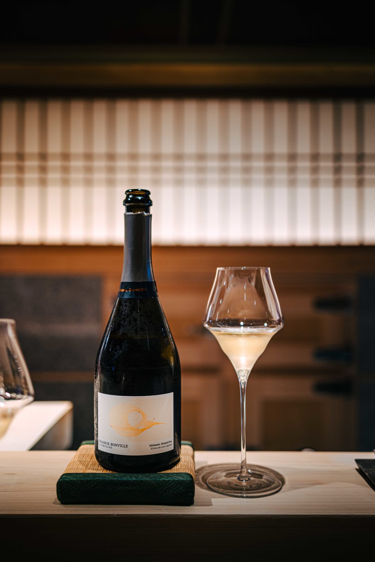 Sushi Juyon by Saito, Seoul: a bottle of Franck Bonville Unisson Grand Cru, Échos de nos origines on the label, beside a glass