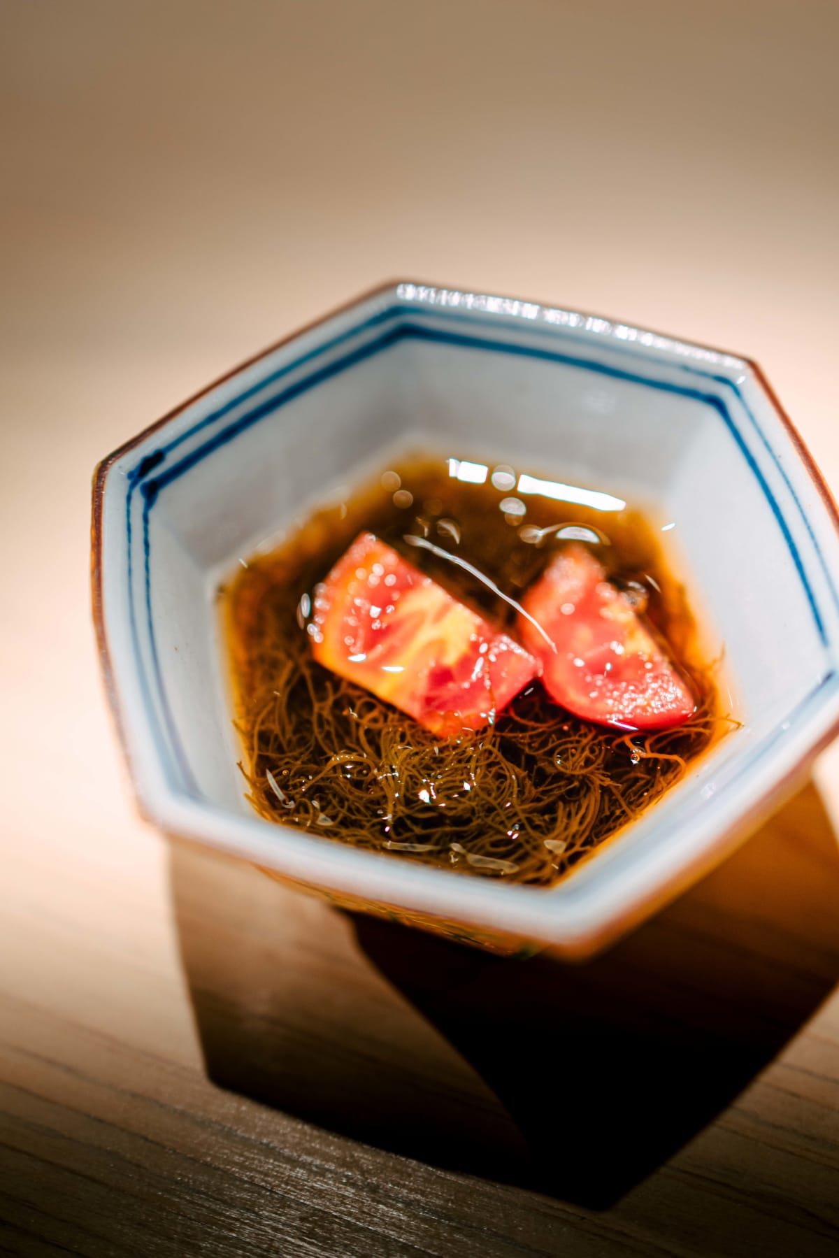 Sushi Juyon by Saito, Seoul: the fine strands of mozuku up close, then the same dish on the second visit