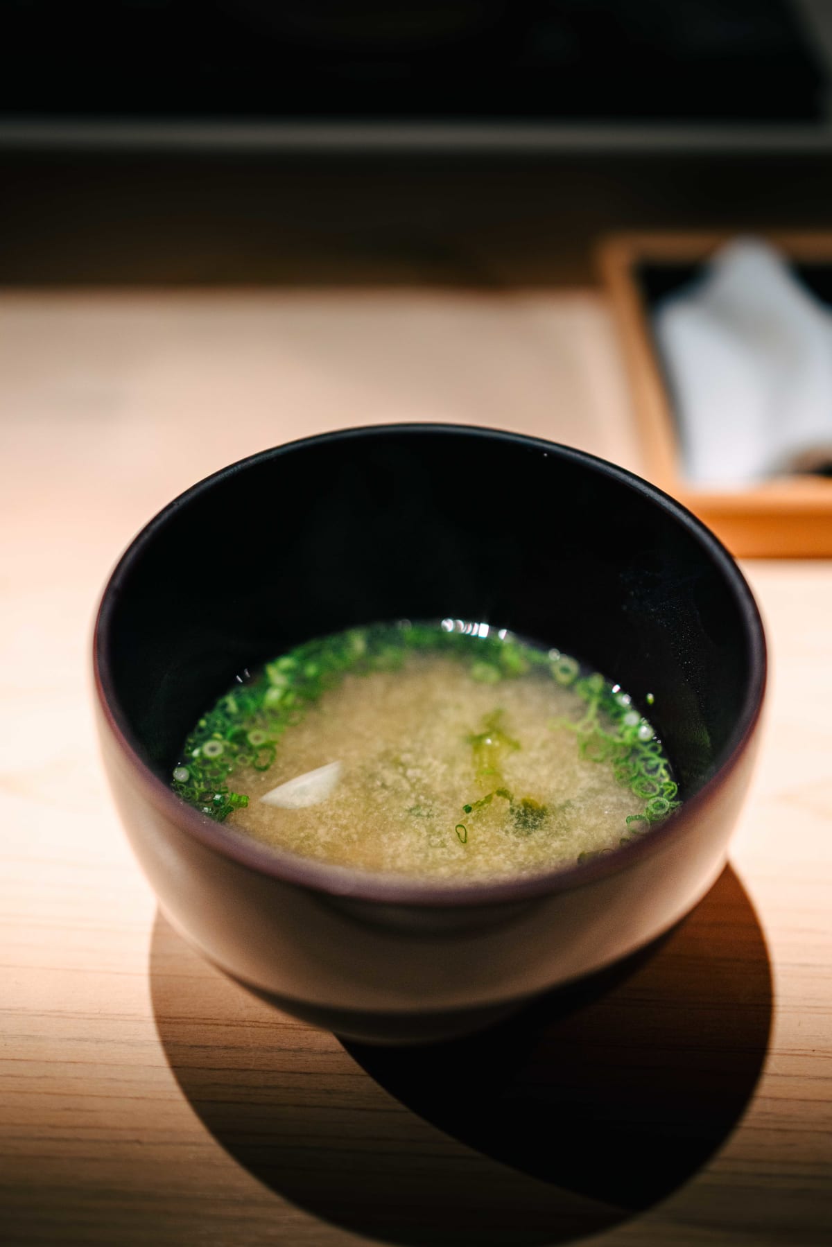 Sushi Juyon by Saito, Seoul: miso soup with chopped spring onion, and the gyoku, on both visits