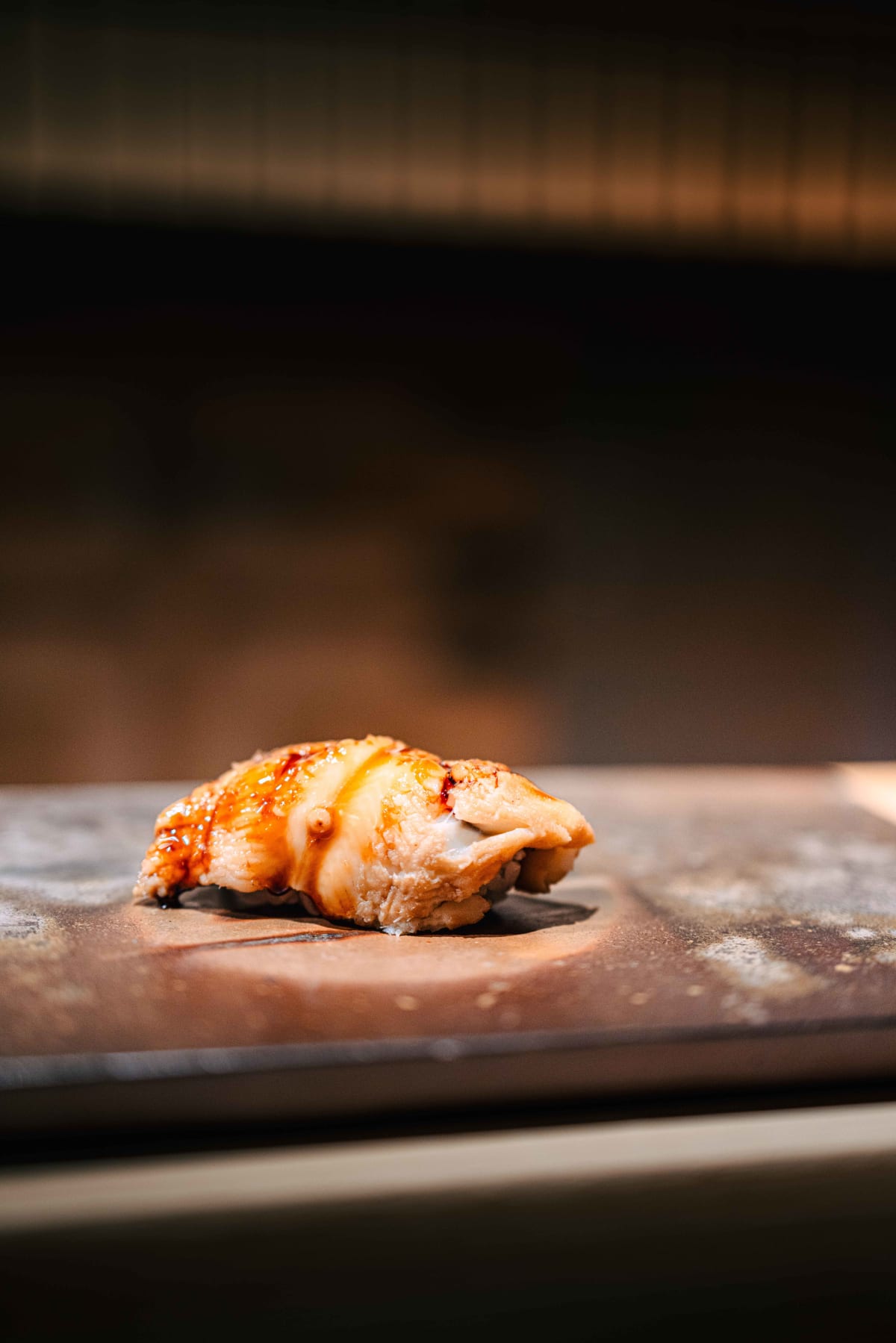 Sushi Juyon by Saito, Seoul: anago nigiri brushed with tare