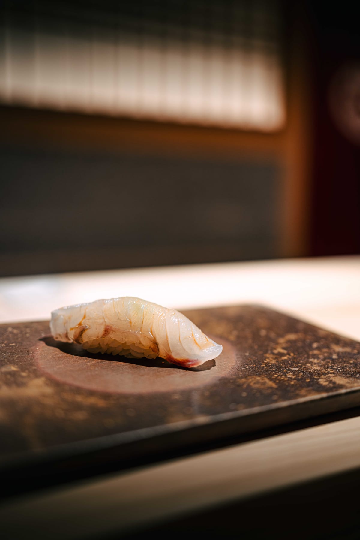 Sushi Juyon by Saito, Seoul: the second visit's nigiri, hirame, kanpachi in pale pink, then kohada