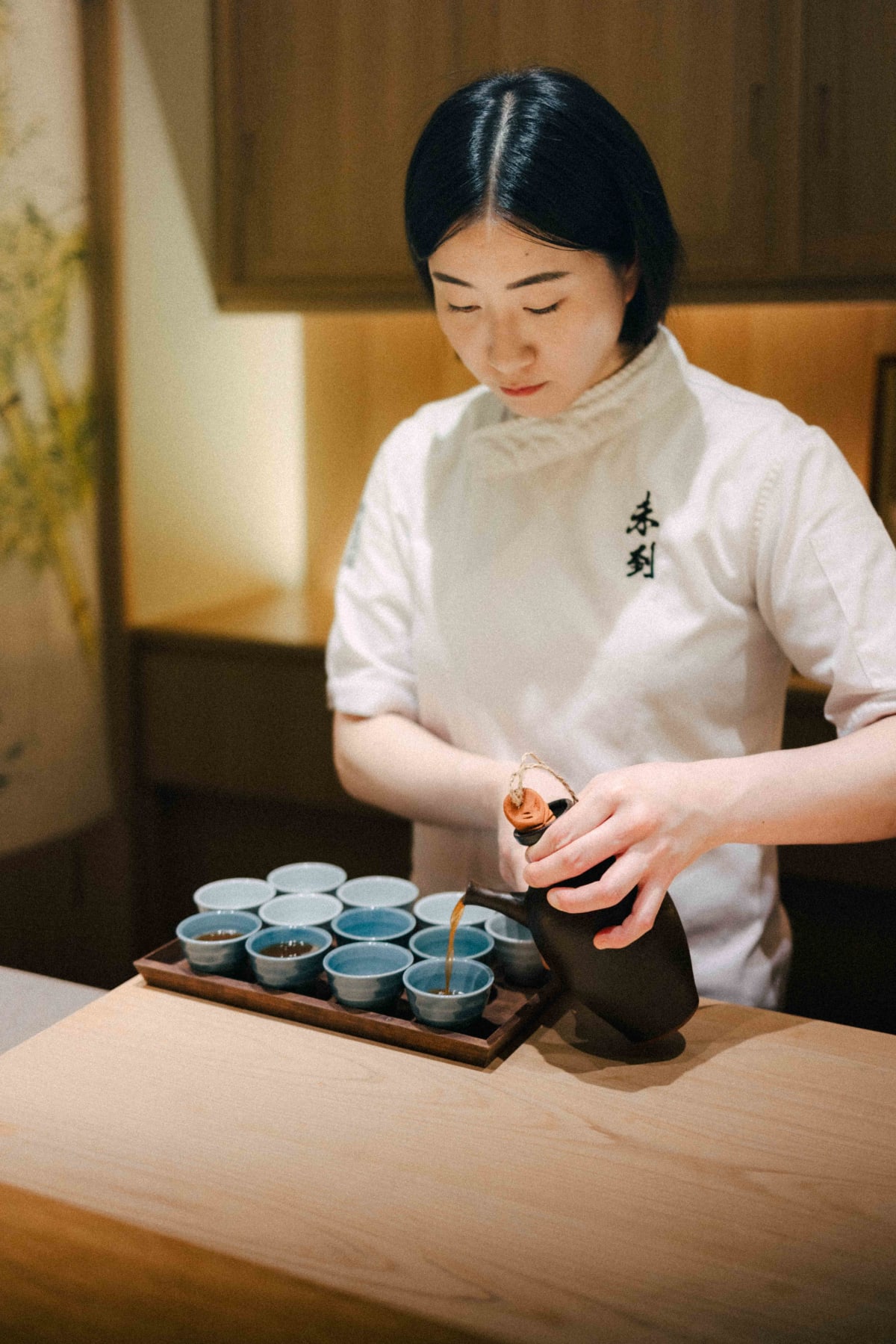 Mitou, Seoul: Kim Bo-mi pouring the hawthorn and herb vodka