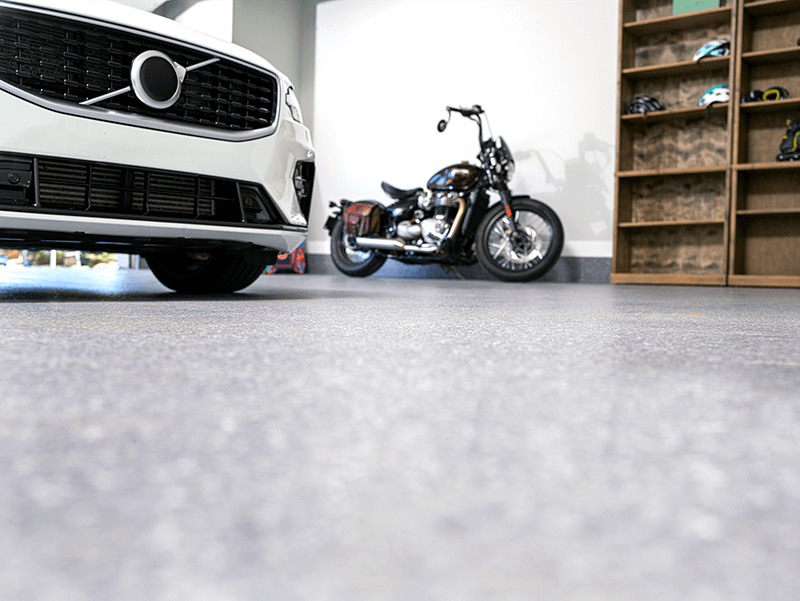 Car and Motorcycle in Garage